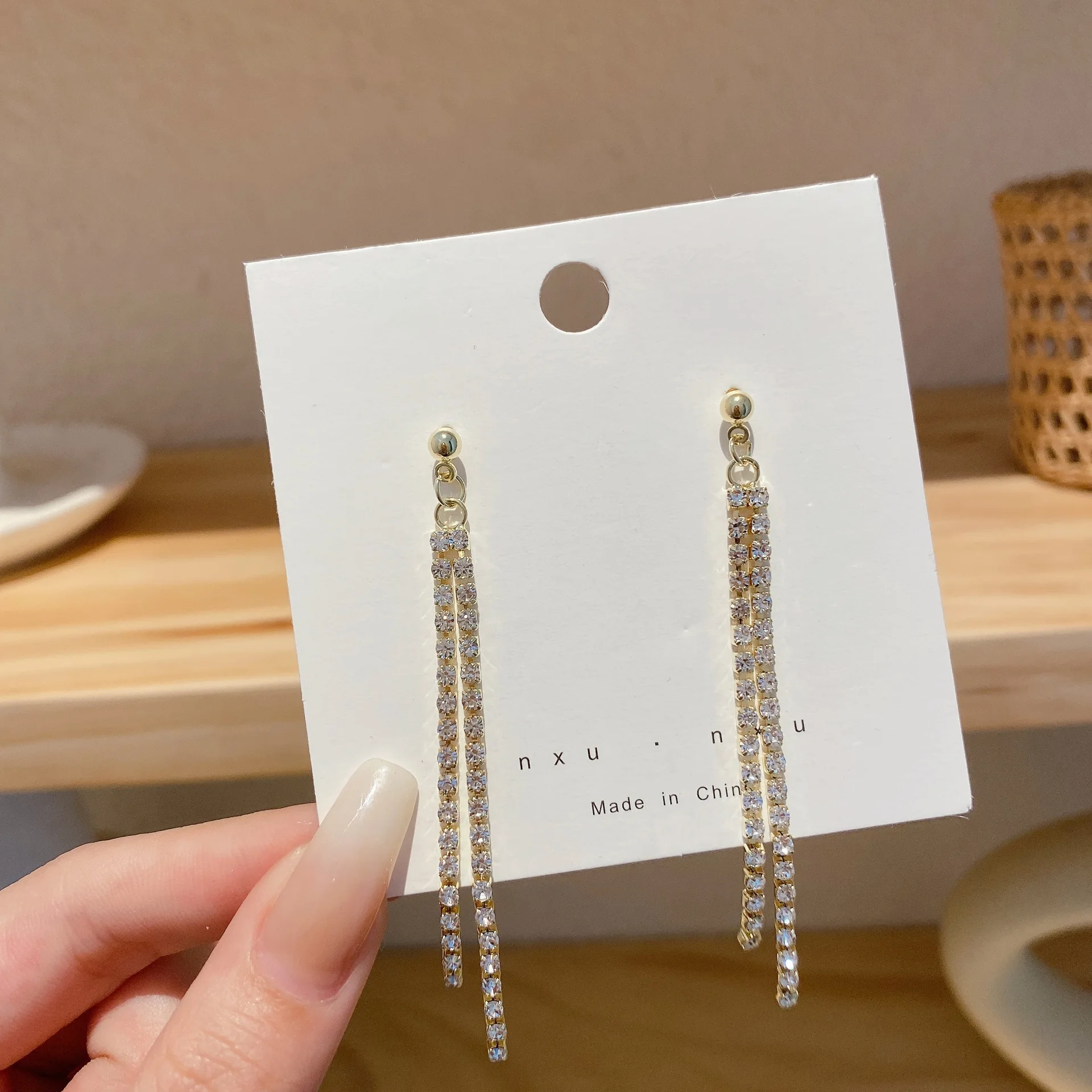 98 grab chain tassel earrings-gold-333